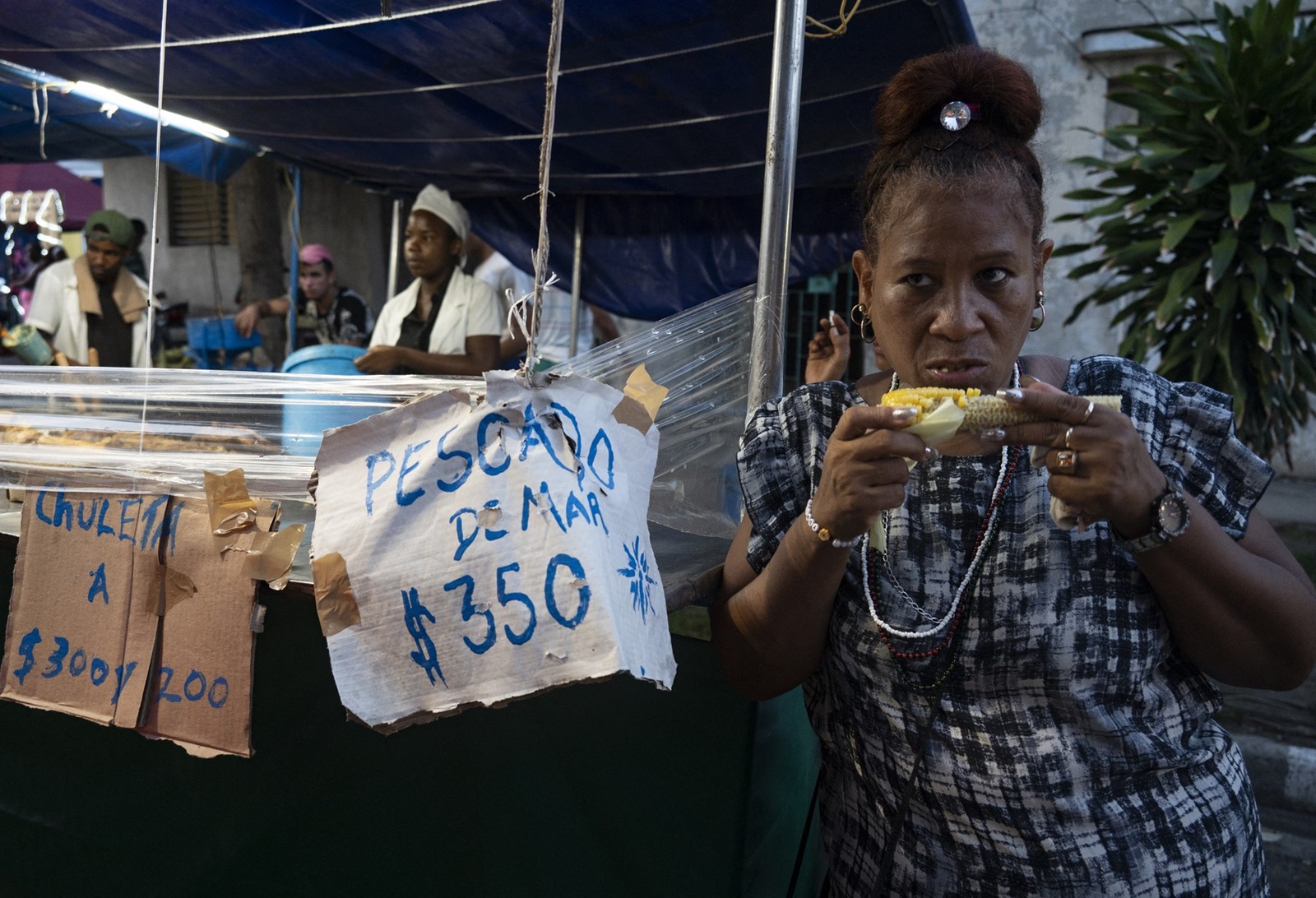 Food vendors participate in the city carnival celebrating the 70th anniversary of the failed attack on the Moncada barracks by a small group of revolutionaries led by Fidel Castro that marked the beginning of the Cuban revolution, in Santiago de Cuba, July 26, 2023.,Image: 792269359, License: Rights-managed, Restrictions: , Model Release: no, Credit line: Yamil LAGE / AFP / Profimedia