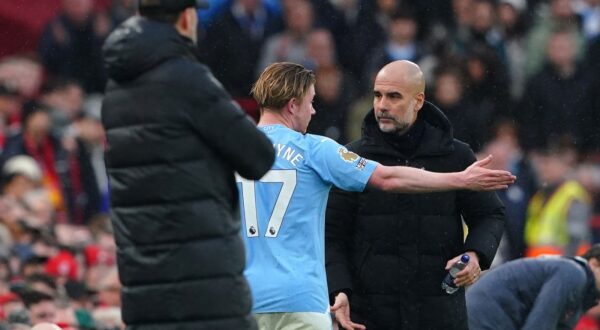 Manchester City's Kevin De Bruyne argues with manager Pep Guardiola after being substituted during the Premier League match at Anfield, Liverpool. Picture date: Sunday March 10, 2024.,Image: 855578279, License: Rights-managed, Restrictions: EDITORIAL USE ONLY No use with unauthorised audio, video, data, fixture lists, club/league logos or "live" services. Online in-match use limited to 120 images, no video emulation. No use in betting, games or single club/league/player publications., Model Release: no, Credit line: Peter Byrne / PA Images / Profimedia