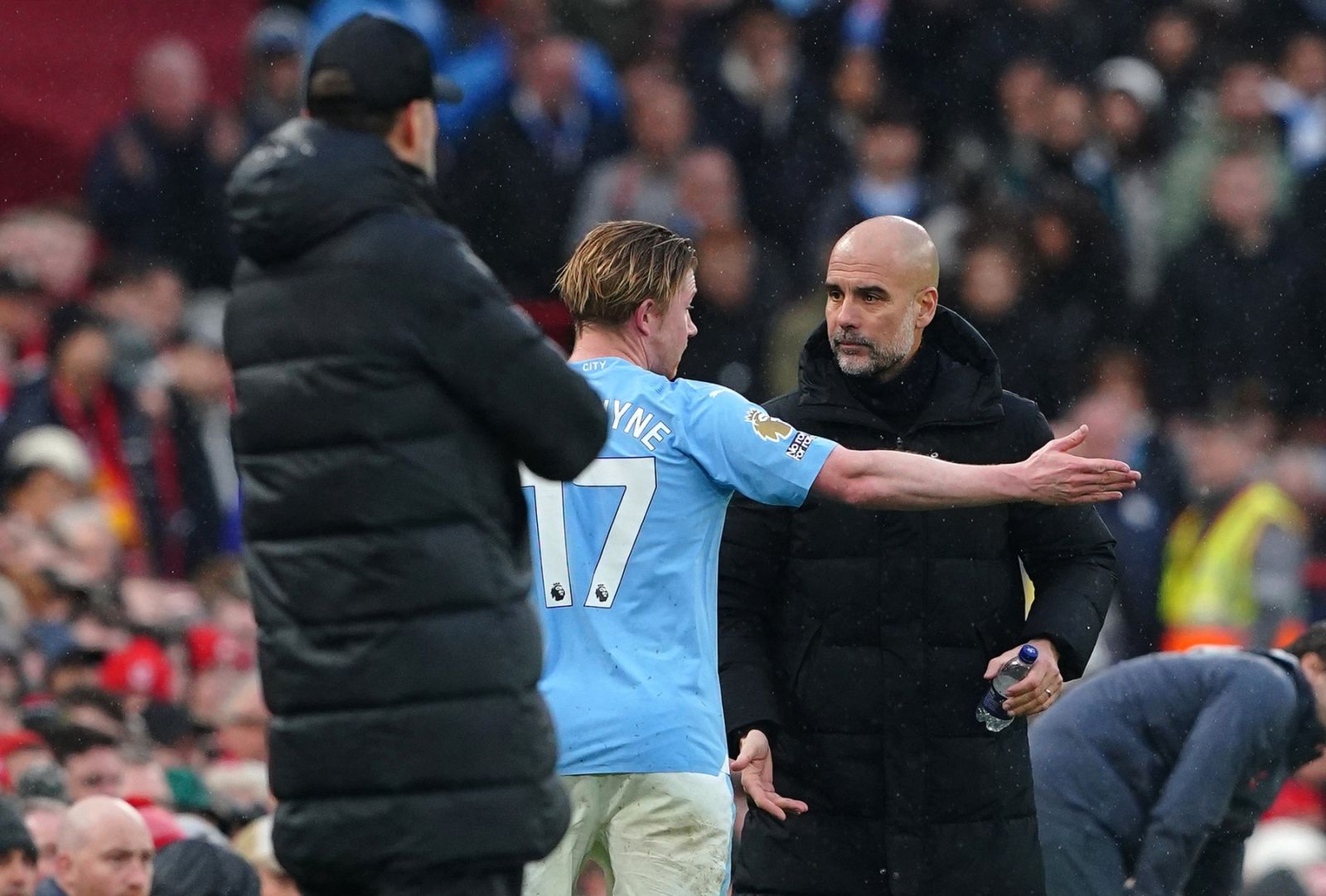 Manchester City's Kevin De Bruyne argues with manager Pep Guardiola after being substituted during the Premier League match at Anfield, Liverpool. Picture date: Sunday March 10, 2024.,Image: 855578279, License: Rights-managed, Restrictions: EDITORIAL USE ONLY No use with unauthorised audio, video, data, fixture lists, club/league logos or "live" services. Online in-match use limited to 120 images, no video emulation. No use in betting, games or single club/league/player publications., Model Release: no, Credit line: Peter Byrne / PA Images / Profimedia