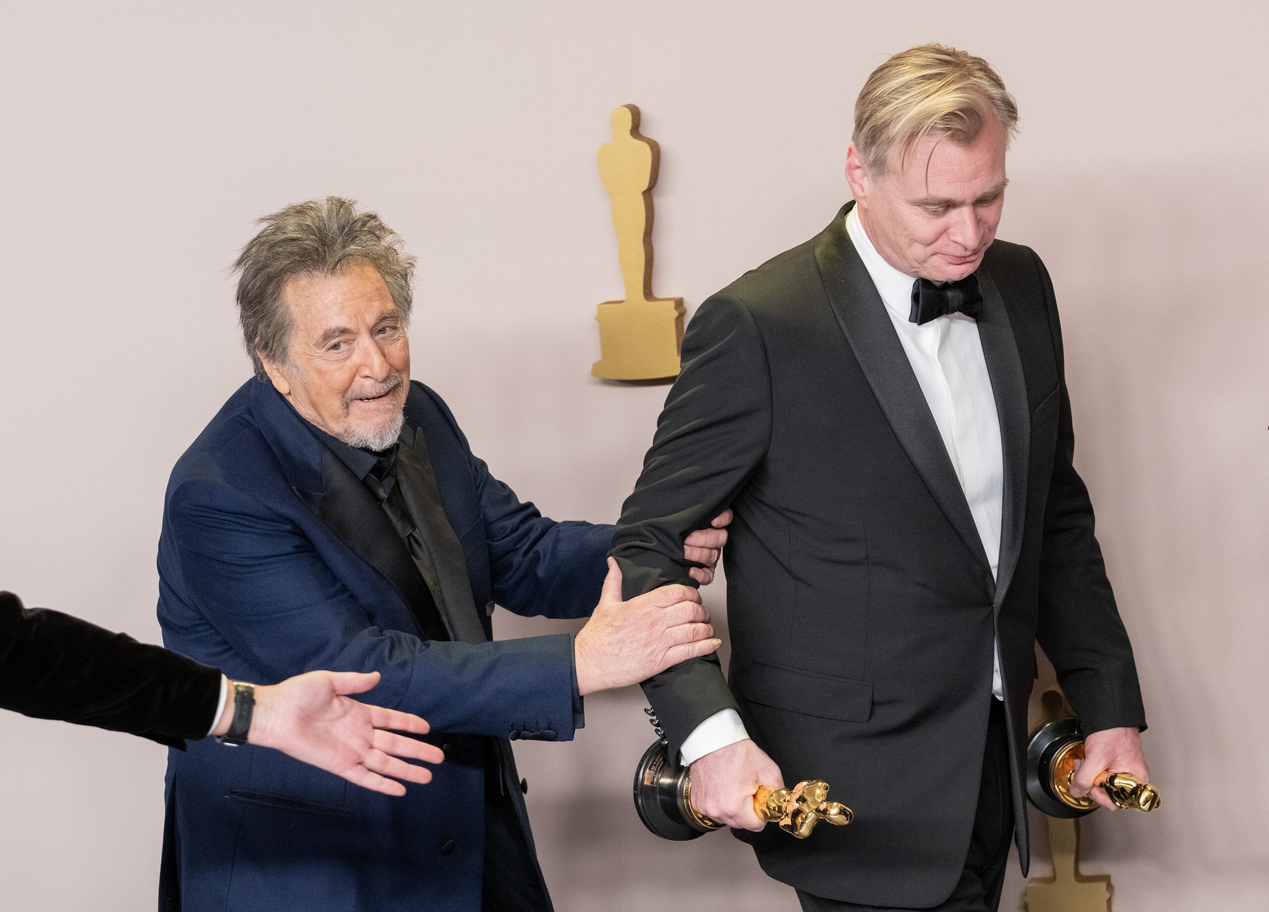 Presenter Al Pacino (L) holds on to Best Picture and Best Director winner Christopher Nolan backstage during the 96th annual Academy Awards in Los Angeles, California, on Sunday, March 10, 2024. Since 1929, the Oscars have recognized excellence in cinematic achievements. Photo by /UPI,Image: 855894850, License: Rights-managed, Restrictions: , Model Release: no, Credit line: PAT BENIC / UPI / Profimedia