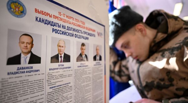 A service member votes in Russia's presidential election in Moscow on March 15, 2024.,Image: 857016830, License: Rights-managed, Restrictions: , Model Release: no, Credit line: NATALIA KOLESNIKOVA / AFP / Profimedia