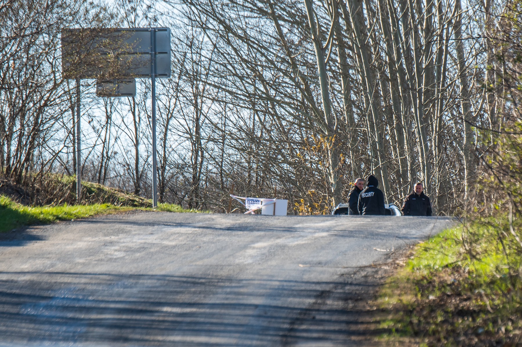 Hungarian police officers close the road near the crash site where a vehicle taking part in the Esztergom Nyerges Rally veered off from the road on March 24, 2024, near Bajot, 55kms away from Budapest. Four people were killed and several others injured when a vehicle competing in a Hungarian rally on March 24 afternoon skidded off the road and crashed into spectators, authorities said. According to a police statement, a vehicle taking part in the Esztergom Nyerges Rally in northern Hungary, for reasons yet unclear, veered off the road and crashed into spectators.,Image: 859235184, License: Rights-managed, Restrictions: , Model Release: no, Credit line: FERENC ISZA / AFP / Profimedia