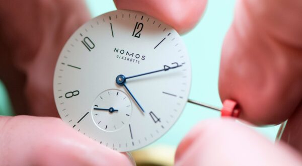 14 March 2019, Saxony, Glashütte: A watchmaker adjusts the hands of the watch model Tangente 33 in the watch manufactory Nomos. Photo: Sebastian Kahnert/dpa-Zentralbild/ZB,Image: 679710101, License: Rights-managed, Restrictions: , Model Release: no, Credit line: Sebastian Kahnert / DPA / Profimedia