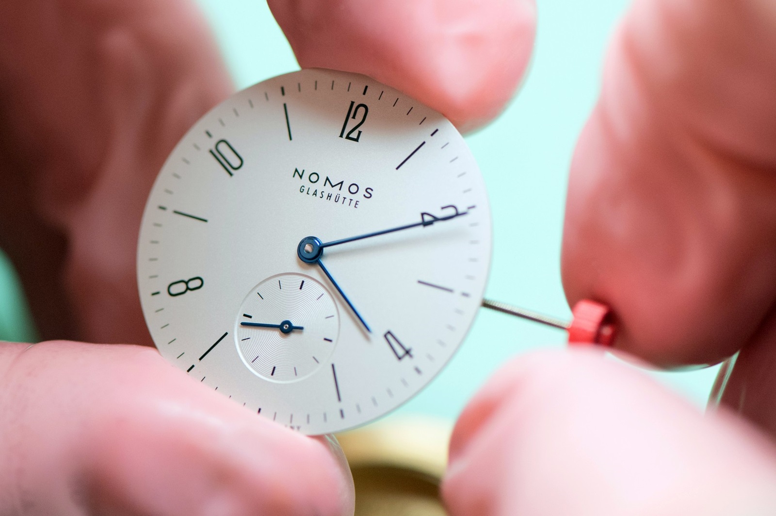 14 March 2019, Saxony, Glashütte: A watchmaker adjusts the hands of the watch model Tangente 33 in the watch manufactory Nomos. Photo: Sebastian Kahnert/dpa-Zentralbild/ZB,Image: 679710101, License: Rights-managed, Restrictions: , Model Release: no, Credit line: Sebastian Kahnert / DPA / Profimedia