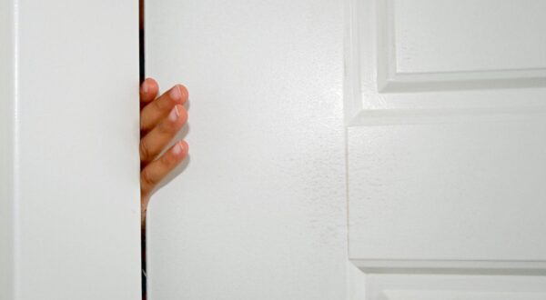 Small fingers stuck in white door inside of house,Image: 557350207, License: Royalty-free, Restrictions: , Model Release: no, Credit line: Nadine Mitchell / Panthermedia / Profimedia