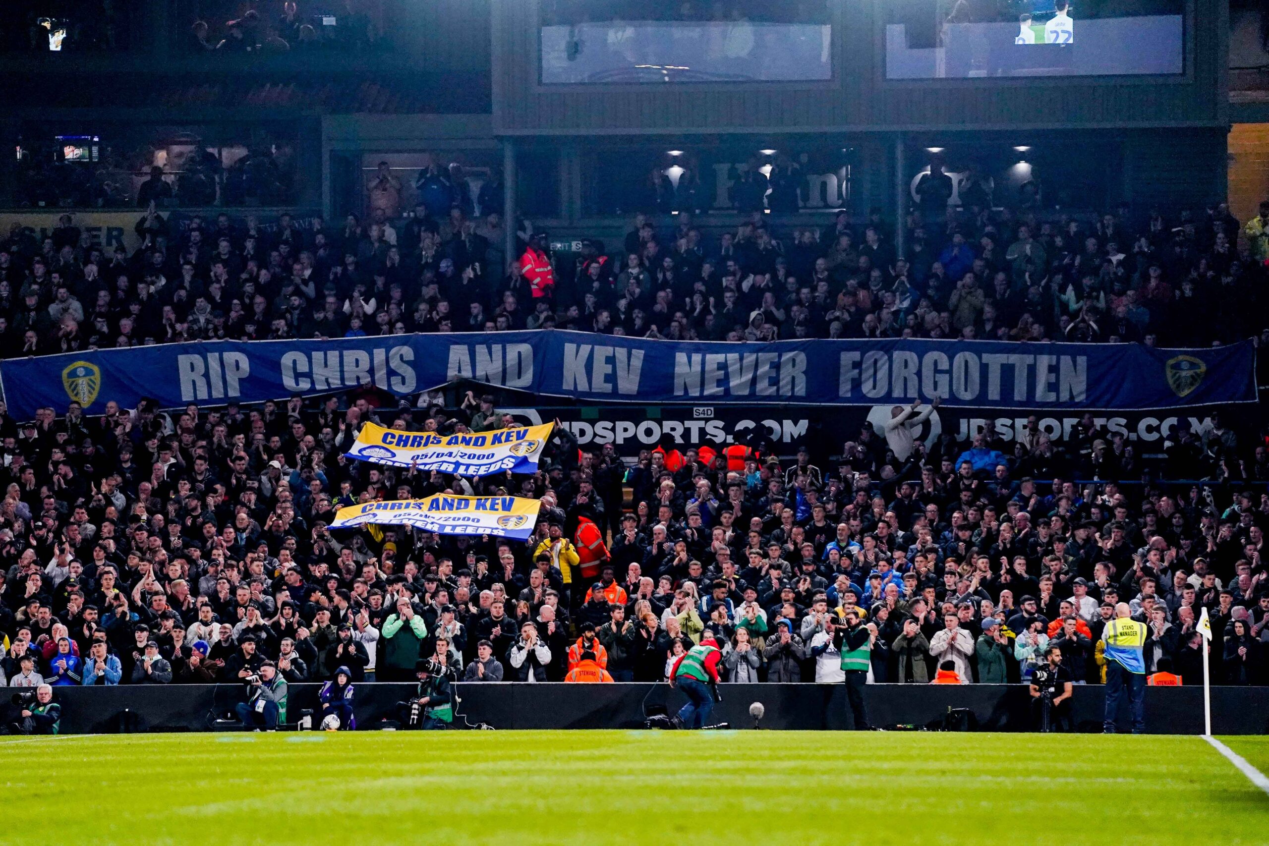 Leeds United v Hull City EFL Sky Bet Championship 01/04/2024. Leeds United fans display a banner and flags to commemorate 24 years since the passing of Leeds United fans Kevin Speight and Christopher Loftus during the EFL Sky Bet Championship match between Leeds United and Hull City at Elland Road, Leeds, England on 1 April 2024. Leeds Elland Road West Yorkshire England Editorial use only DataCo restrictions apply See www.football-dataco.com , Copyright: xMalcolmxBrycex PSI-19354-0037