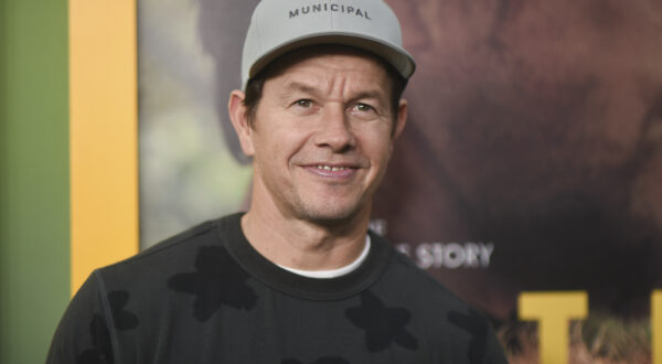 Mark Wahlberg, left, and Ukai arrive at the premiere of "Arthur the King" on Monday, Feb. 19, 2024, in Los Angeles. (Photo by Richard Shotwell/Invision/AP)