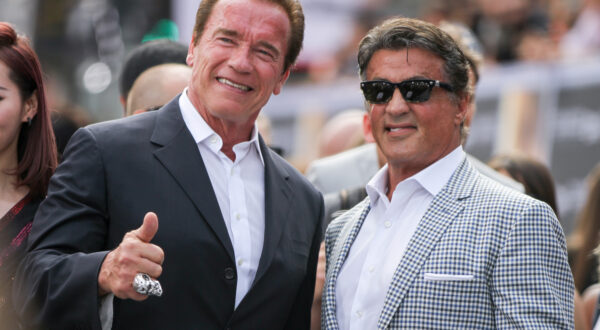 Arnold Schwarzenegger, left, and Sylvester Stallone arrives at the LA Premiere of "Terminator Genisys" at the Dolby Theatre on Sunday, June 28, 2015, in Los Angeles. (Photo by Rich Fury/Invision/AP)