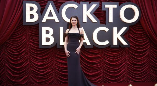 epa11265955 British actor Marisa Abela poses at the world premiere of Back to Black at the Odeon Luxe in central London, Britain, 08 April 2024. The film tells the story of British singer-songwriter Amy Winehouse.  EPA/TOLGA AKMEN