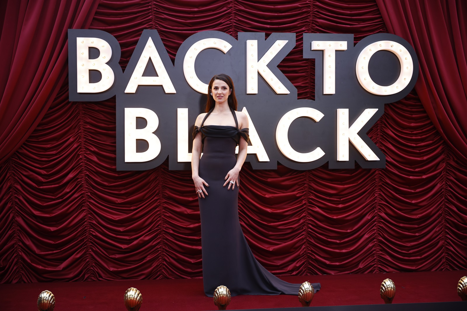 epa11265955 British actor Marisa Abela poses at the world premiere of Back to Black at the Odeon Luxe in central London, Britain, 08 April 2024. The film tells the story of British singer-songwriter Amy Winehouse.  EPA/TOLGA AKMEN