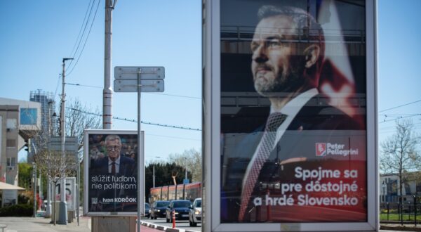 epa11256967 Election posters of presidential candidates, speaker of the National Council Peter Pellegrini (R) and of former Slovak foreign minister Ivan Korcok (L), in Bratislava, Slovakia, 03 April 2024. Pesidential candidates, Ivan Korcok and Peter Pellegrini, will face each other in the second round of the presidential election in Slovakia on 06 April 2024.  EPA/JAKUB GAVLAK