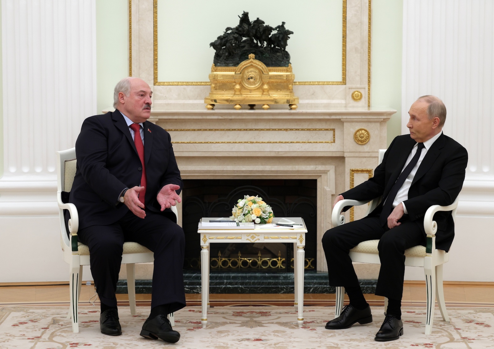 epa11273620 Russian President Vladimir Putin (R) speaks with Belarusian President Alexander Lukashenko during their meeting at the Kremlin in Moscow, Russia, 11 April 2024.  EPA/GAVRIIL GRIGOROV/SPUTNIK/KREMLIN POOL MANDATORY CREDIT
