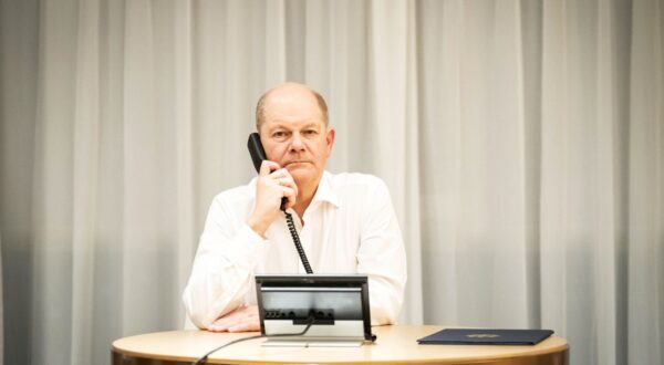 epa11278336 A handout photo made available by the German federal press office (BPA) shows German Chancellor Olaf Scholz during a telephone conference call with the G7 heads of states and governments, while on a visit to Chongqing, China, 14 April 2024. G7 leaders held a conference call to discuss Iran's overnight attack on Israel. Iran's Islamic Revolutionary Guards Corps (IRGC) on late 13 April 2024 launched drones and rockets towards Israel, Iranian officials said. The IDF said Israel’s defense systems, as well as Israel’s allies in the region, intercepted 99 percent of more than "300 threats of various types" launched from Iran against Israel overnight.  EPA/Steffen Kugler/German federal press office/HANDOUT / POOL   HANDOUT EDITORIAL USE ONLY/NO SALES HANDOUT EDITORIAL USE ONLY/NO SALES