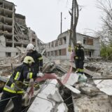 epa11284581 Ukrainian rescuers work at the site of a missile strike in Chernihiv, northern Ukraine, 17 April 2024, amid the Russian invasion. At least 17 people were killed and 60 others injured, including three children, following a Russian missile strike in Chernihiv, the State Emergency Service of Ukraine (SESU) said, adding that a search and rescue operation was ongoing. A social infrastructure facility, a hospital, and several residential high-rise buildings were damaged as a result of the morning rocket attack in Chernihiv, north of Kyiv, Ukrainian officials said.  EPA/SERHII OLEXANDROV