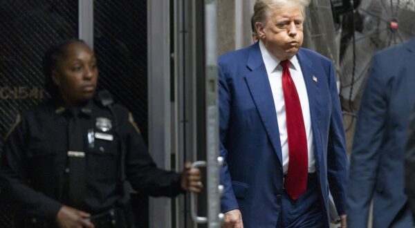 epa11310499 Former US President Donald Trump returns to the courtroom following a short break in his criminal trial at New York State Supreme Court in New York, New York, USA, 30 April 2024. Trump is facing 34 felony counts of falsifying business records related to payments made to adult film star Stormy Daniels during his 2016 presidential campaign.  EPA/JUSTIN LANE / POOL