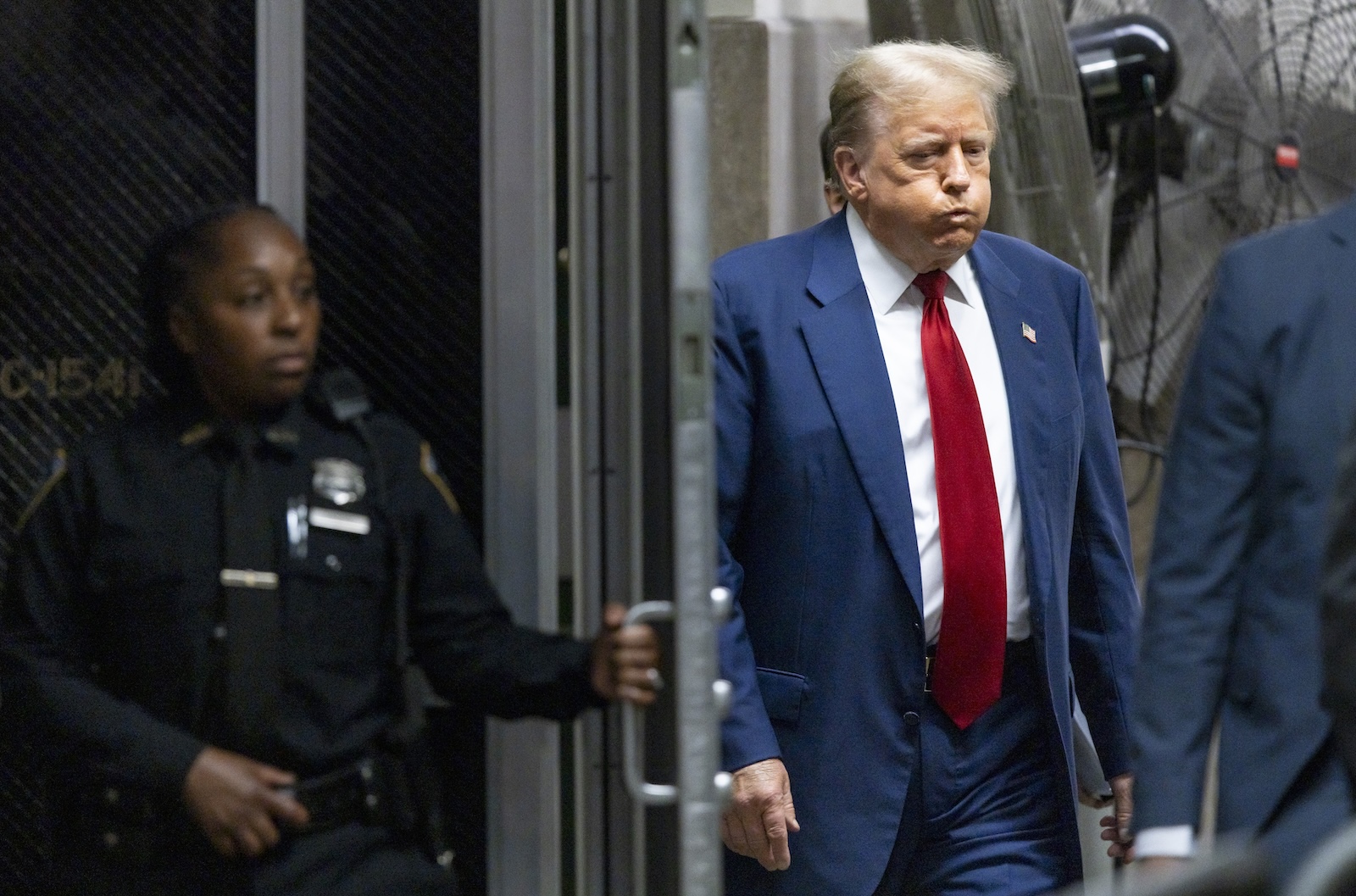 epa11310499 Former US President Donald Trump returns to the courtroom following a short break in his criminal trial at New York State Supreme Court in New York, New York, USA, 30 April 2024. Trump is facing 34 felony counts of falsifying business records related to payments made to adult film star Stormy Daniels during his 2016 presidential campaign.  EPA/JUSTIN LANE / POOL