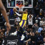Apr 12, 2024; Memphis, Tennessee, USA; Los Angeles Lakers forward LeBron James (23) dunks during the second half against the Memphis Grizzlies at FedExForum. Mandatory Credit: Petre Thomas-USA TODAY Sports Photo: Petre Thomas/REUTERS