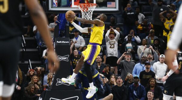Apr 12, 2024; Memphis, Tennessee, USA; Los Angeles Lakers forward LeBron James (23) dunks during the second half against the Memphis Grizzlies at FedExForum. Mandatory Credit: Petre Thomas-USA TODAY Sports Photo: Petre Thomas/REUTERS