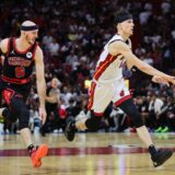 Apr 19, 2024; Miami, Florida, USA; Miami Heat guard Tyler Herro (14) passes the basketball against the Chicago Bulls in the fourth quarter during a play-in game of the 2024 NBA playoffs at Kaseya Center. Mandatory Credit: Sam Navarro-USA TODAY Sports Photo: Sam Navarro/REUTERS