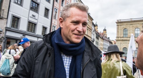 May 2, 2020, Munich, Bavaria, Germany: Petr Bystron of the German Bundestag at a conspiracy demo in Munich, Germany.  Bystron has been associated with right-extremists, as well as with the arm South African white supremacist Suilanders.  On the heels of a violent attack against ZDF journalists in Berlin, the Munich Hygienedemos took place again, complete with conspiracy theorists, right-extremists, neonazis, Hooligans, AfD members, insults and aggression towards journalists and police, and violations of the infection protection laws.  Organized in Telegram chats by conspiratorial "Querfront" (cross-front) groups, the organizers planned several individual demos with instructions to eventually move to a central location in order to exceed maximum numbers stating "then police can't do anything".  Numerous right-extremists, Verfassungsschutz-monitored figures, QAnon fans, and AfD politicians were in attendance.  The groups are of the belief that the anti-Coronavirus measures are power-grabs.   Querfront groups are often a mix of political outliers,  AfD members, right-extremists and neonazis, conspiracy theorists, Reichsbuerger (sovereign citizens), and other anti-system figures attempting to delegitimize the state.  The character of the demos is overwhelmingly Pegida 2015-2016 in nature.,Image: 516590826, License: Rights-managed, Restrictions: , Model Release: no, Credit line: Sachelle Babbar / Zuma Press / Profimedia