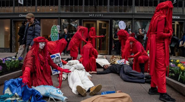 Climate activists from the group Extinction Rebellion (XR) and the Red Rebel Brigade hold a “die in” during "The Funeral for Nature" in Boston, Massachusetts, on April 20, 2024. XR and other activist groups are calling for climate action by Massachusetts Governor Maura Healey and her administration. The demonstration according to XR coincides with funeral processions taking place at the same time in England, Australia, Sweden and Portugal.,Image: 866565286, License: Rights-managed, Restrictions: , Model Release: no, Credit line: Joseph Prezioso / AFP / Profimedia
