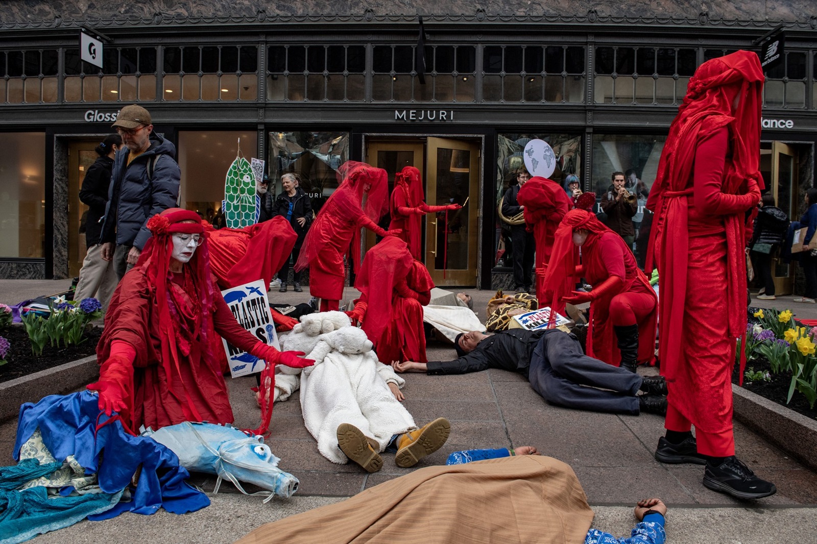 Climate activists from the group Extinction Rebellion (XR) and the Red Rebel Brigade hold a “die in” during "The Funeral for Nature" in Boston, Massachusetts, on April 20, 2024. XR and other activist groups are calling for climate action by Massachusetts Governor Maura Healey and her administration. The demonstration according to XR coincides with funeral processions taking place at the same time in England, Australia, Sweden and Portugal.,Image: 866565286, License: Rights-managed, Restrictions: , Model Release: no, Credit line: Joseph Prezioso / AFP / Profimedia