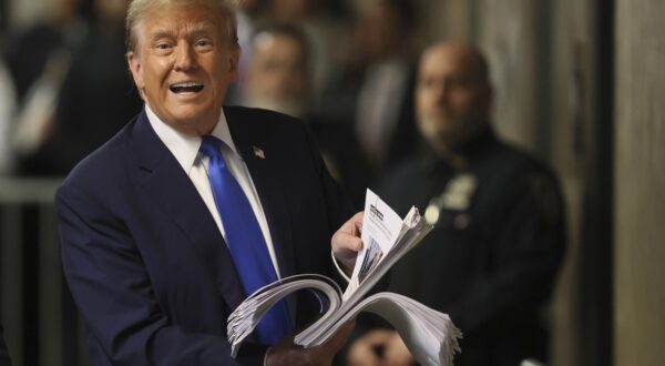 April 18, 2024; New York, New York; Former U.S. President Donald Trump speaks to the media, while holding news clippings, as his trial continues over charges that he falsified business records to conceal money paid to silence porn star Stormy Daniels in 2016, in Manhattan criminal court.,Image: 866028175, License: Rights-managed, Restrictions: *** World Rights ***, Model Release: no, Credit line: USA TODAY Network / ddp USA / Profimedia