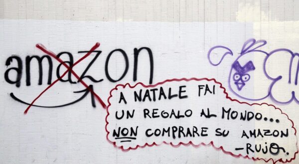 Italy, Milan - April 24, 2024.Amazon fined 10 million Euros for inducing consumers to make periodic purchases.Ten million euo fine for Amazon for having set the pre-selection of the periodic purchase on its platform, for many products present on e-commerce, limiting the freedom of consumers..Archive photo of protest graffiti against Amazon  / Padova, Italy,Image: 867506954, License: Rights-managed, Restrictions: * France, Germany and Italy Rights Out *, Model Release: no, Credit line: Brancolini/Fotogramma / Zuma Press / Profimedia
