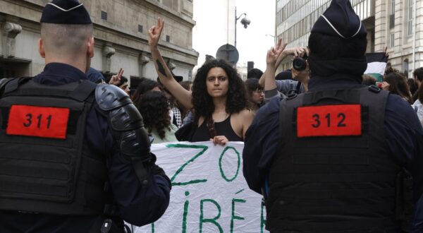 A protester make a victory sign during a rally in support of Palestinians at the Sorbonne University in Paris on April 29, 2024. Students gathered at midday on April 29, 2024 at the Sorbonne to express their support for the Palestinians in front of the building and inside the university, where they set up tents, following the similar action at Sciences Po of April 26, 2024, a day of blockades and mobilisation, marked by tensions.,Image: 868839876, License: Rights-managed, Restrictions: , Model Release: no, Credit line: Geoffroy VAN DER HASSELT / AFP / Profimedia