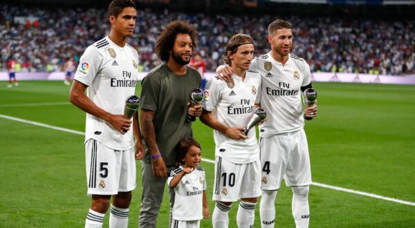 September 29, 2018 - Raphael Varane, Marcelo, Luka Modric and Sergio Ramos of Real Madrid with trophy during the La Liga (Spanish Championship) football match between Real Madrid and Atletico de Madrid on September 29th, 2018 at Santiago Bernabeu stadium in Madrid, Spain.,Image: 389062959, License: Rights-managed, Restrictions: , Model Release: no, Credit line: AFP7 / Zuma Press / Profimedia