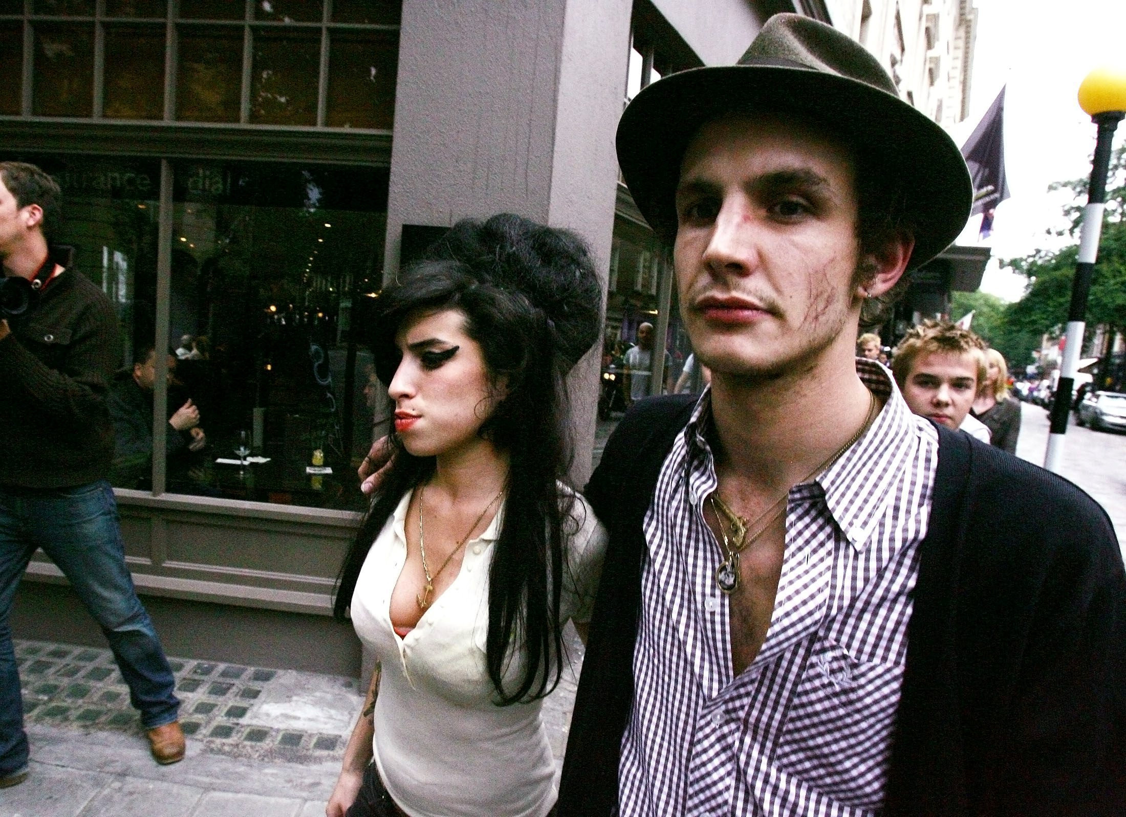 Singer Amy Winehouse and husband Blake Fielder-Civil. (file photo) See SWNS story SWCCoverdose. The ex-husband of Amy Winehouse suffered another family tragedy when his younger brother died of a drugs overdose, it has emerged. Freddy Civil, the younger brother of the singer's former lover Blake Civil-Fielder, died last year after a heroin overdose, an inquest heard. Jurors were told Freddy, 27, absconded from a mental health hospital before checking into a �40-a-night B&B in Leeds, where he administered the fatal dose of drugs. Medics were called to the hotel, where Freddy was staying with a friend, and found him face down in just his underpants and he was tragically pronounced dead at the scene.,Image: 739409710, License: Rights-managed, Restrictions: This image is not available for use at a stock rate unless with prior agreement. This image hereby disclosed to your organisation is so disclosed on the condition that your organisation will take all steps necessary to ensure that any identifiable personal data is processed in full compliance with the Data Protection Act 2018

follow us on twitter - @swns
browse our website - swns.com
email pix@swns.com, Model Release: no, Credit line: SWNS / SWNS / Profimedia