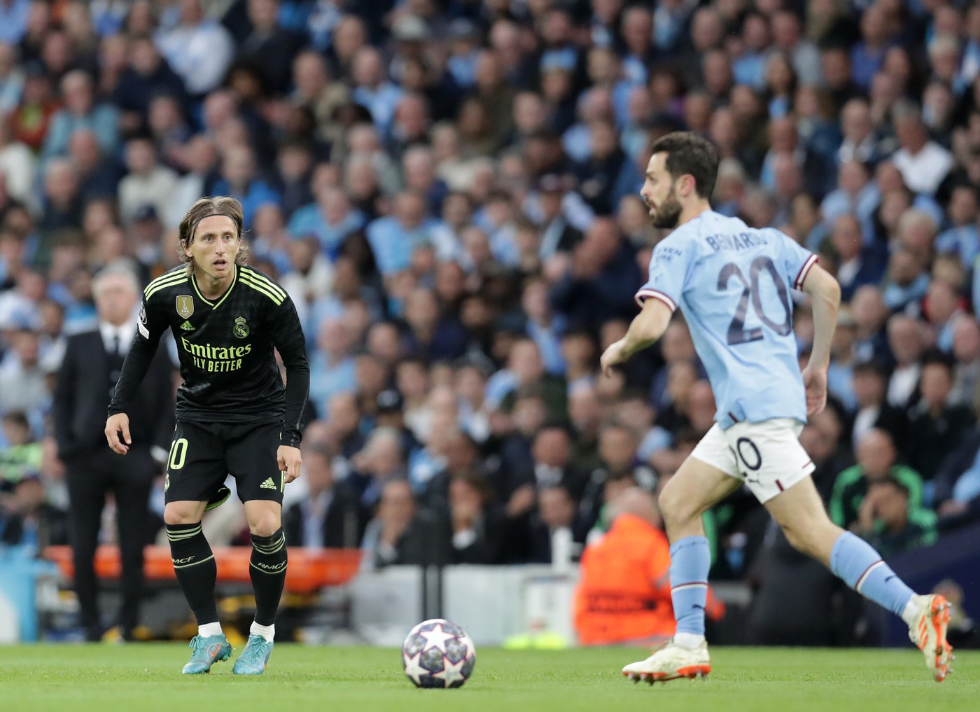 17th May 2023; Etihad Stadium, Manchester, England; Champions League Football, Semi Final Second Leg, Manchester City versus Real Madrid; Luka Modric of Real Madrid looks on as Bernardo Silva of Manchester City runs with the ball,Image: 777154741, License: Rights-managed, Restrictions: , Model Release: no, Credit line: David Blunsden / Actionplus / Profimedia