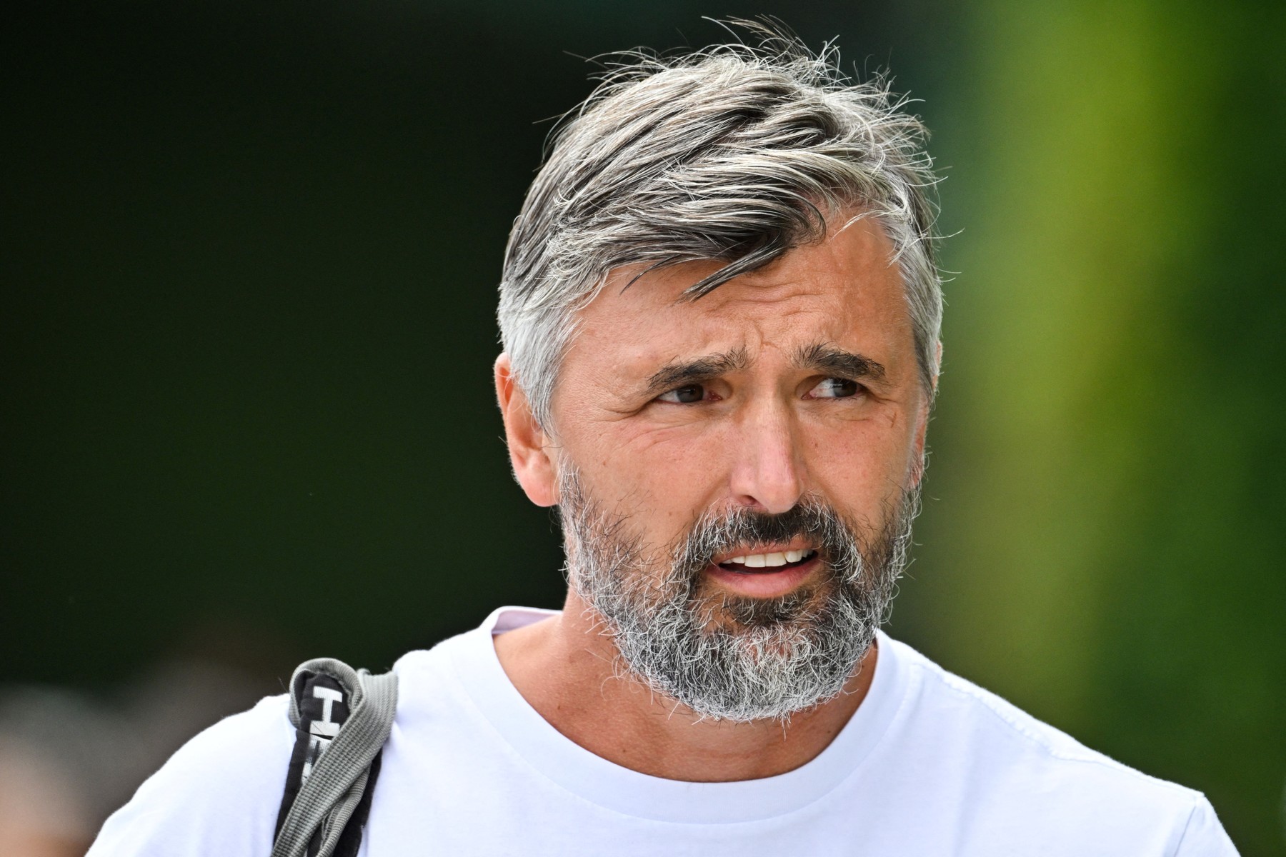 Goran Ivanisevic, the coach of Serbia's Novak Djokovic, reacts as he arrives to take part in a training session prior to the start of the 2023 Wimbledon Championships at The All England Tennis Club in Wimbledon, southwest London, on July 2, 2023.,Image: 786744710, License: Rights-managed, Restrictions: RESTRICTED TO EDITORIAL USE, Model Release: no, Credit line: Glyn KIRK / AFP / Profimedia