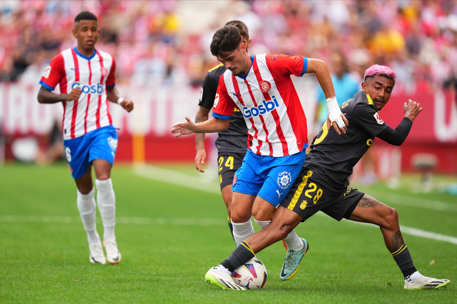 ESP: Girona FC-UD Las Palmas. La Liga EA Sports. Date 4 Miguel Gutierrez of Girona FC and Julian Araujo of UD Las Palmas during the La Liga EA Sports match between Girona FC and UD Las Palmas played at Montilivi Stadium on September 3, 2023 in Girona, Spain. kpng Copyright: xAlexxCarrerasx/xPRESSINPHOTOx PS_230903_707,Image: 847736070, License: Rights-managed, Restrictions: Credit images as "Profimedia/ IMAGO", Model Release: no, Credit line: Alex Carreras / PRESSINPHOTO / imago sportfotodienst / Profimedia