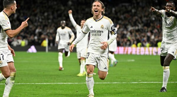Real Madrid's Croatian midfielder #10 Luka Modric celebrates scoring his team first goal during the Spanish league football match between Real Madrid CF and Sevilla FC at the Santiago Bernabeu stadium in Madrid on February 25, 2024.,Image: 850747748, License: Rights-managed, Restrictions: , Model Release: no, Credit line: JAVIER SORIANO / AFP / Profimedia