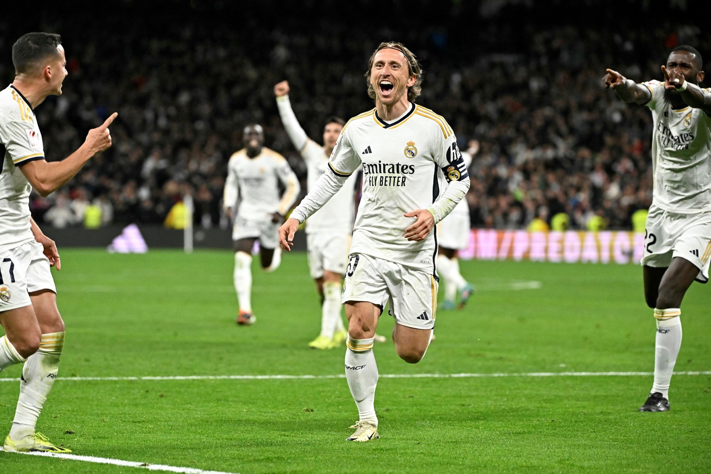 Real Madrid's Croatian midfielder #10 Luka Modric celebrates scoring his team first goal during the Spanish league football match between Real Madrid CF and Sevilla FC at the Santiago Bernabeu stadium in Madrid on February 25, 2024.,Image: 850747748, License: Rights-managed, Restrictions: , Model Release: no, Credit line: JAVIER SORIANO / AFP / Profimedia