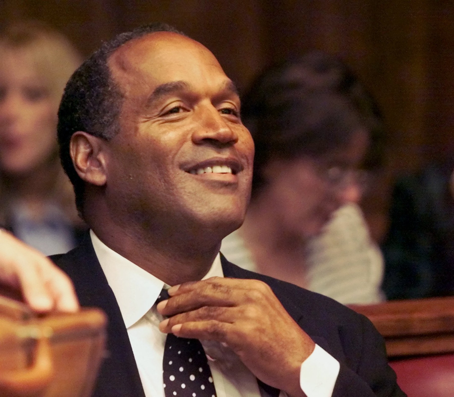 (FILES) O.J. Simpson adjusts his tie before the jury selection of his trial at the Miami circuit court October 9, 2001 in Miami, Florida.  Simpson is on trial for an incident stemming from a December traffic altercation in which a motorist accused him of reaching into his car and pulling off his glasses.  Simpson has died at the age of 76, his family said on April 11, 2024.,Image: 864068875, License: Rights-managed, Restrictions: , Model Release: no, Credit line: AL DIAZ / AFP / Profimedia