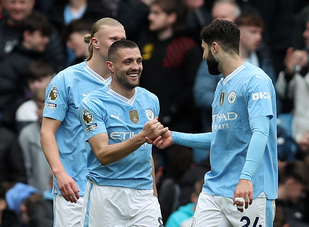 13th April 2024; Etihad Stadium, Manchester, England; Premier League Football, Manchester City versus Luton Town; Mateo Kovacic of Manchester City  is congratulated by his team mates after scoring for 2-0 after 64 minutes,Image: 864519391, License: Rights-managed, Restrictions: , Model Release: no, Credit line: David Blunsden / Actionplus / Profimedia
