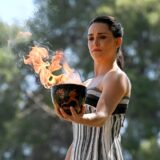 Greek actress Mary Mina, playing the role of the High Priestess, holds the Olympic flame during the rehearsal of the flame lighting ceremony for the Paris 2024 Olympics Games at the ancient temple of Hera on the Olympia archeological site, birthplace of the ancient Olympics in southern Greece, on April 15, 2024.,Image: 864966570, License: Rights-managed, Restrictions: , Model Release: no, Credit line: Aris MESSINIS / AFP / Profimedia
