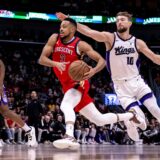 Apr 19, 2024; New Orleans, Louisiana, USA;  New Orleans Pelicans guard CJ McCollum (3) dribbles against Sacramento Kings forward Domantas Sabonis (10) in the first half during a play-in game of the 2024 NBA playoffs at Smoothie King Center.,Image: 866374174, License: Rights-managed, Restrictions: , Model Release: no, Credit line: USA TODAY Sports / ddp USA / Profimedia