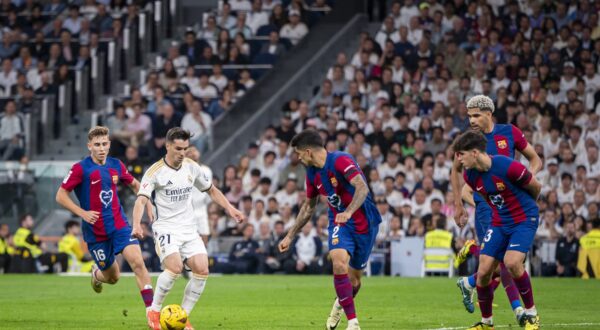 Brahim Diaz of Real Madrid (C) and Fermin Lopez of FC Barcelona (L) and Joao Cancelo and Pau Cubarsi of FC Barcelona (R) seen in action during the La Liga EA Sports 2023/24 football match between Real Madrid vs FC Barcelona at Estadio Santiago Bernabeu on April 21, 2024 in Madrid, Spain. Real Madrid 3 : 2 FC Barcelona,Image: 866880241, License: Rights-managed, Restrictions: *** World Rights ***, Model Release: no, Credit line: SOPA Images / ddp USA / Profimedia