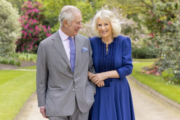 A handout photo issued by the Royal Household on April 26, 2024 shows Britain's King Charles III and Queen Camilla in the garden of Buckingham Palace in London, on April 10. British head of state King Charles III will make a limited return to public duties next week, after doctors said they were 