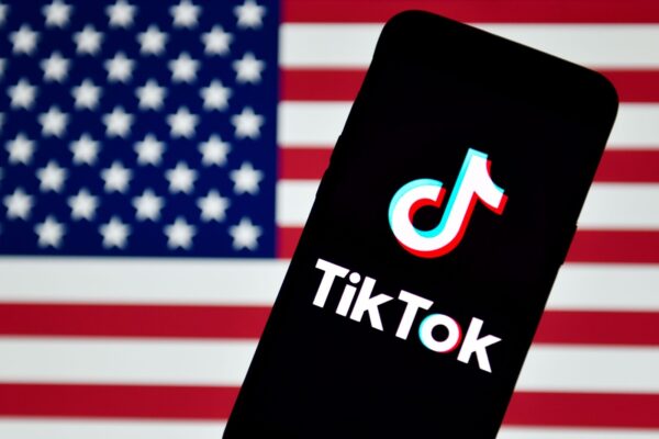In this photo illustration a TikTok logo is seen displayed on a smartphone with the chinese flag in the background. - Sheldon Cooper / SOPA Images//SOPAIMAGES_TikTok(2)/2009141023/Credit:SOPA Images / SIPA/SIPA/2009141024,Image: 557871230, License: Rights-managed, Restrictions: , Model Release: no, Credit line: SOPA Images / Sipa Press / Profimedia