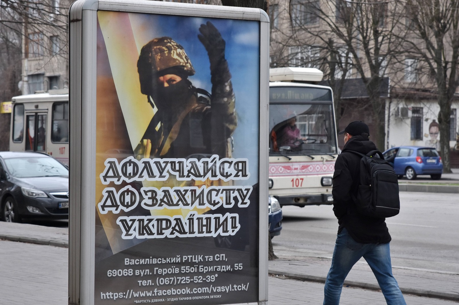 A man walks past the recruitment poster for the Ukrainian armed forces in the center of Zaporizhzhia. When Russia launched its full-scale invasion in 2022, many Ukrainians volunteered to defend their country. But that pool has been exhausted and a large proportion of the men of fighting age are unwilling to be deployed to the front. Only men aged 27 or older have been recruited, with those serving on the battlefield being on average in their 40s. A new mobilisation law â€” due to be put to a parliamentary vote on March 31 â€” seeks to update the countryâ€™s legal framework ahead of a probable recruitment wave this year in which up to 500,000 people could be drafted. - Andriy Andriyenko / SOPA Images//SOPAIMAGES_08480043/Credit:SOPA Images/SIPA/2403210919,Image: 858451341, License: Rights-managed, Restrictions: , Model Release: no, Credit line: SOPA Images / Sipa Press / Profimedia