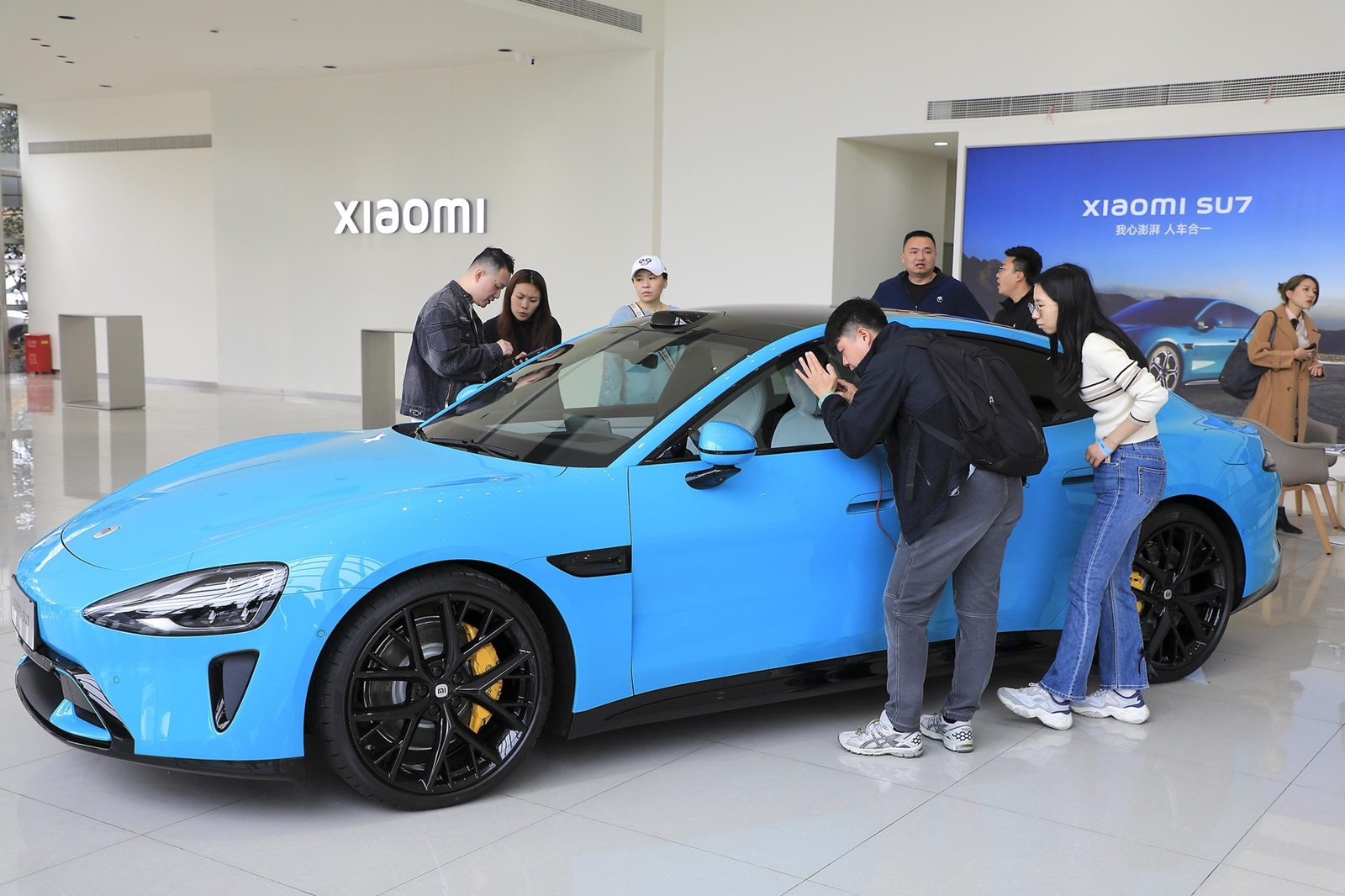 Xiaomi put its new electric vehicle SU7 on display, drawing crowds in Shanghai, 25 March, 2024.,Image: 860285365, License: Rights-managed, Restrictions: *** World Rights Except China (including Hong Kong, Macau, and Taiwan) and France *** CHNOUT FRAOUT
HKGOUT MACOUT TWNOUT, Model Release: no, Credit line: ChinaImages / ddp USA / Profimedia