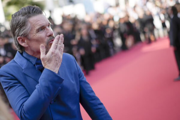 Ethan Hawke poses for photographers upon arrival at the premiere of the film 'Triangle of Sadness' at the 75th international film festival, Cannes, southern France, Saturday, May 21, 2022. (AP Photo/Daniel Cole)