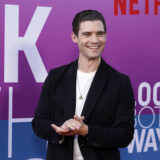 David Corenswet poses at the premiere of the Netflix film 