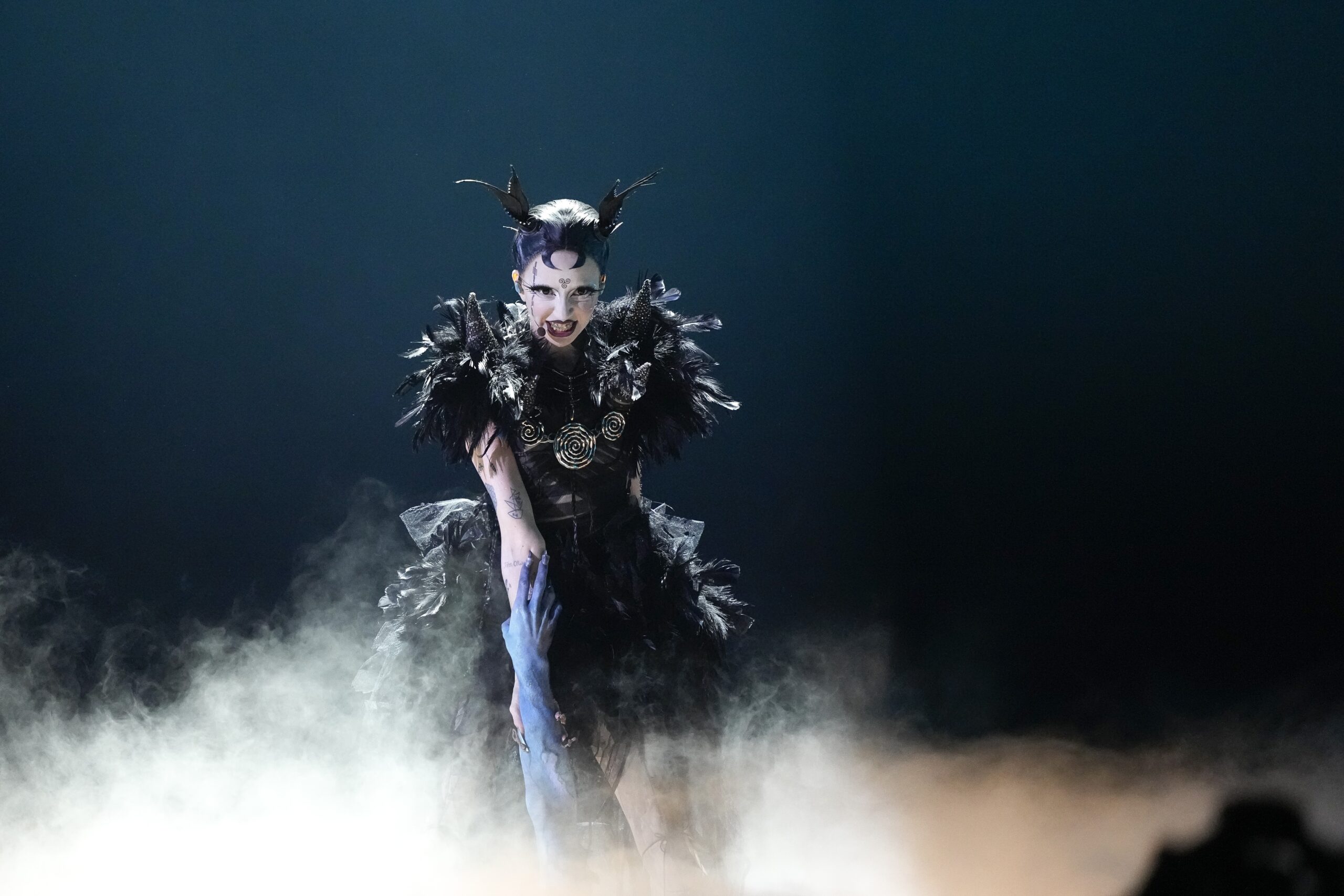 Bambie Thug of Ireland performs the song Doomsday Blue during the dress rehearsal for the first semifinal at the Eurovision Song Contest in Malmo, Sweden, Monday, May 6, 2024. (AP Photo/Martin Meissner)
