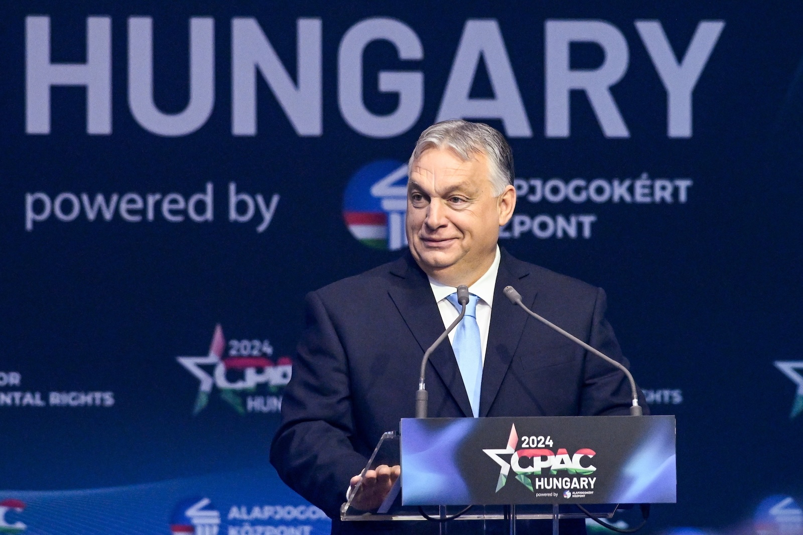 epa11299493 Hungarian Prime Minister Viktor Orban delivers his address at the third Hungarian edition of the Conservative Political Action Conference (CPAC) Hungary, in Budapest, Hungary, 25 April 2024. The two-day event, taking place 25 and 26 April, is hosted by the Center for Fundamental Rights of Hungary for the third consecutive year.  EPA/SZILARD KOSZTICSAK HUNGARY OUT
