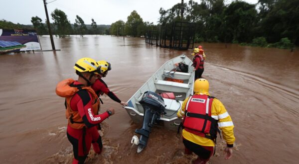 epa11314434 A handout photo made available by the Government of Rio Grande Do Sul shows rescue workers searching for survivors in the floods caused by heavy rains in Rio Pardinho, Brazil, 01 May 2024 (issued 02 May 2024). At least ten people died, and another 21 remain missing in the South of Brazil after the heavy rains that have affected the region since last Monday in Rio Grande Do Sul, officials said.  EPA/Lauro Alves HANDOUT IMAGE ONLY AVAILABLE TO ILLUSTRATE THE ACCOMPANYING STORY/CREDIT MANDATORY HANDOUT EDITORIAL USE ONLY/NO SALES HANDOUT EDITORIAL USE ONLY/NO SALES